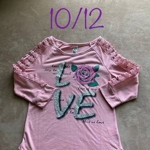 Girls tops, shorts pants in different sizes.